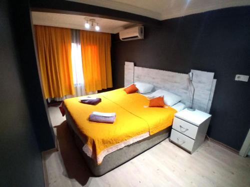 Giường trong phòng chung tại Taksim Detay Home