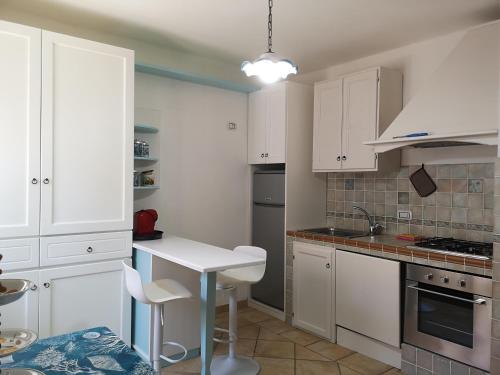 Η κουζίνα ή μικρή κουζίνα στο Casa vacanze Dana