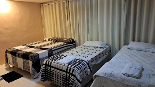 Ένα ή περισσότερα κρεβάτια σε δωμάτιο στο Pousada Flats Meu Refúgio Catimbau inn