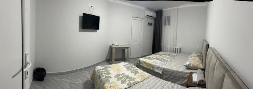 Katil atau katil-katil dalam bilik di Hotel Amigo