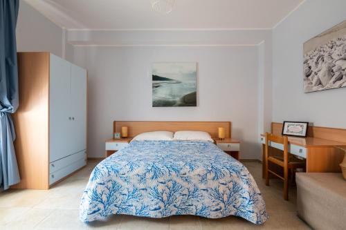 Postel nebo postele na pokoji v ubytování Riva Vieste Suites