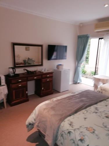 Postel nebo postele na pokoji v ubytování Clivia Guesthouse