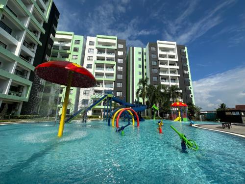 a swimming pool with a water park with a playground at 7&9 Manhattan Condominium Ipoh in Ipoh