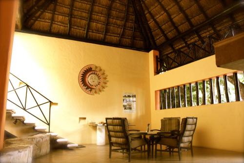 a dining room with a table and chairs at Hotel LunaSol in Playa del Carmen