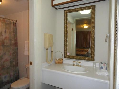 Ett badrum på Hotel Perichi's
