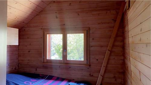 Postel nebo postele na pokoji v ubytování Nid de nature