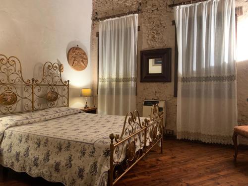 Giường trong phòng chung tại IL CASALE DEL VINO