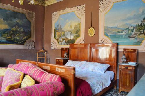 Postel nebo postele na pokoji v ubytování Palazzetto Scodellari