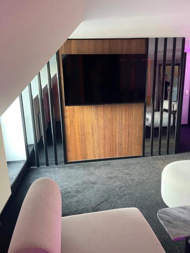 Residenz Seehotel Berlin Brandenburgにあるテレビまたはエンターテインメントセンター
