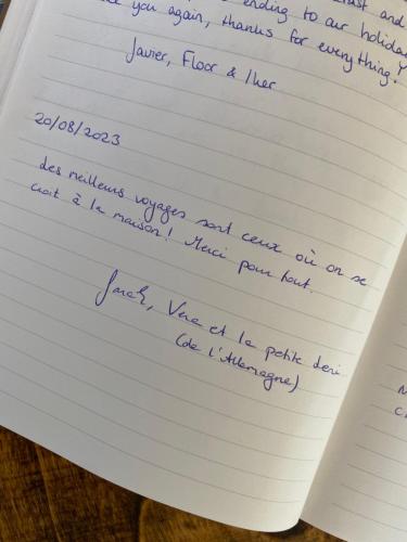 a piece of paper with handwriting on it at Maison La folie douce in Saint-Pierre-de-Manneville