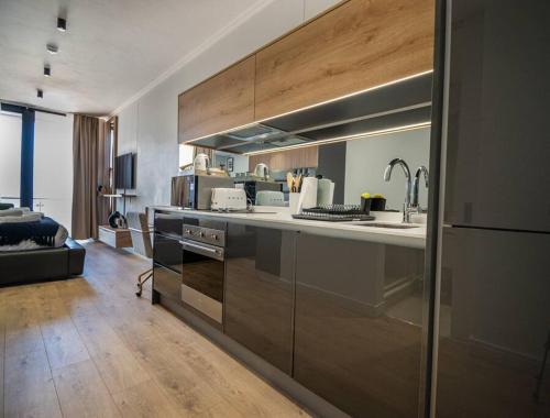 a kitchen with a sink and a counter top at Beautiful Gem at Ellipse in Midrand