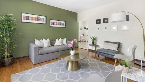 a living room with a couch and a table at Brickell 4ever Apartment Beach 10 minutes Location in Miami