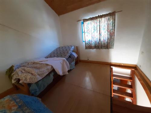 Posteľ alebo postele v izbe v ubytovaní Dptos Rio Neuquen