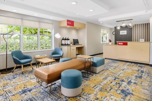 a waiting area in a hospital with chairs and a couch at TownePlace Suites Philadelphia Horsham in Horsham