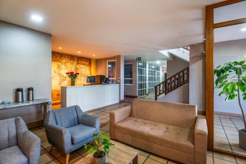 The lobby or reception area at Hotel Xue Sabana