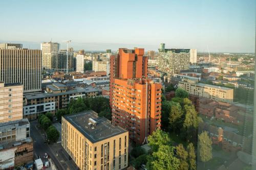 an aerial view of a city with tall buildings at Hampton by Hilton Birmingham Broad Street in Birmingham