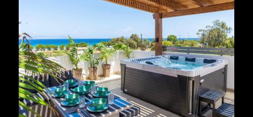 Gallery image of ODYSSEA Top View & Hot Jacuzzi Front Beach in Kremasti