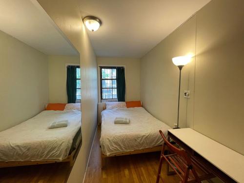 A bed or beds in a room at Central and Affordable Williamsburg Private bedroom Close to Subway