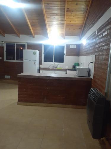 Kuchyň nebo kuchyňský kout v ubytování Quovadis apartamento