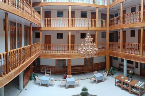 an overhead view of a large building with a chandelier at Hotel Aural in Cajamarca