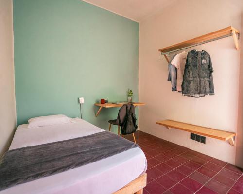 Postel nebo postele na pokoji v ubytování Coliving Chingon