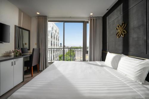 Ένα ή περισσότερα κρεβάτια σε δωμάτιο στο Hanami Suite and Apartment