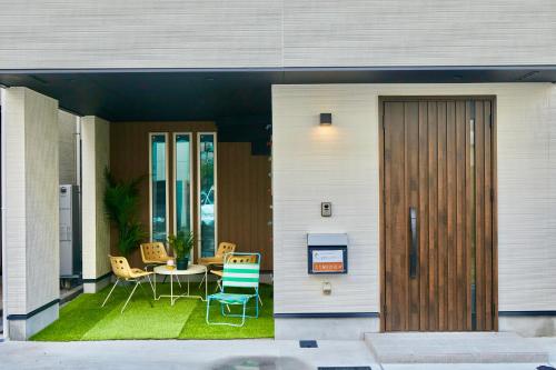 Гостиная зона в Shinjuku 'Orange County' Villa