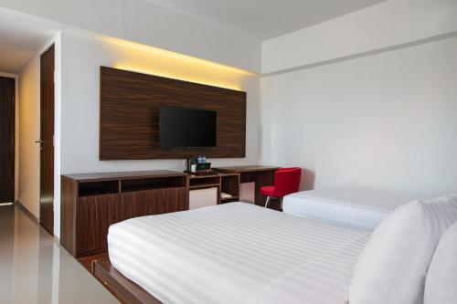 TV a/nebo společenská místnost v ubytování The Bene Hotel