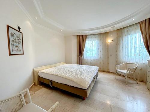 Postel nebo postele na pokoji v ubytování Muhteşem manzaralı tatil evi