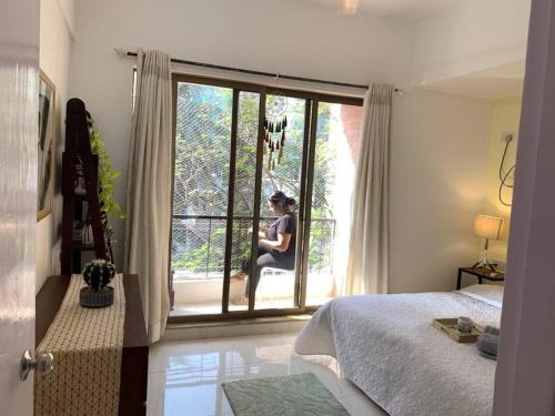 A bed or beds in a room at Little Hut 301, 27th Road, Khar West by Connekt Homes