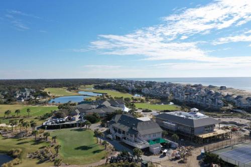 an aerial view of a resort with the ocean at Marsh Mellow in Southport