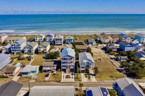 an aerial view of a resort with the ocean at Blue Oasis in Carolina Beach