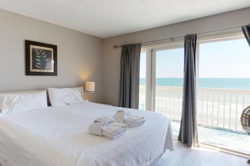 Postel nebo postele na pokoji v ubytování Dune Our Thing