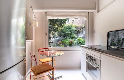Kuchyň nebo kuchyňský kout v ubytování Passione Charme Apartment