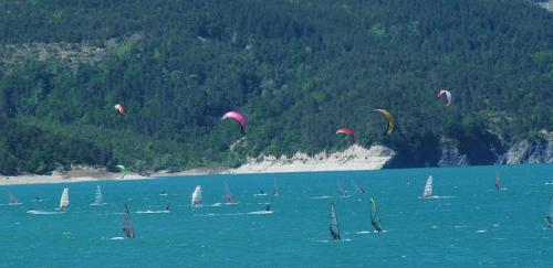 a large group of sailboats in the water at Chambre LA LONGERE in Treffort