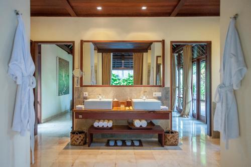 Fotografie z fotogalerie ubytování Komaneka at Tanggayuda Ubud v Ubudu