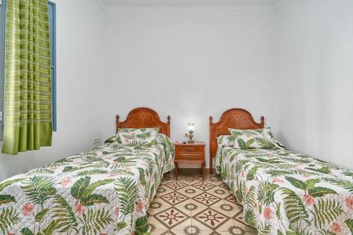 Postel nebo postele na pokoji v ubytování Casa Rafalita