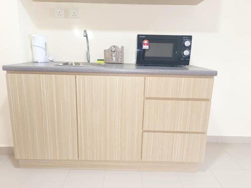 Cucina o angolo cottura di Desaru Homestay Southern, Tiara Desaru Seaview Residensi