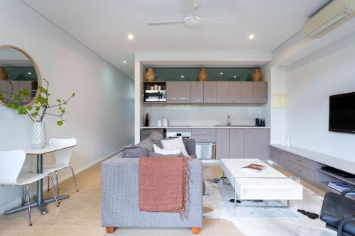 a living room with a couch and a kitchen at Dunn Bay Apartment 3 - Dunsborough in Dunsborough