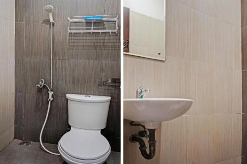 a bathroom with a toilet and a sink at OYO Life 92614 Rukost E-3 Colombus in Karawang