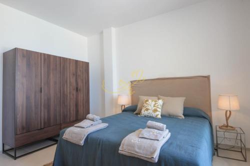 Katil atau katil-katil dalam bilik di TD Villa Grecale Modern Luxury Villa with Sea View