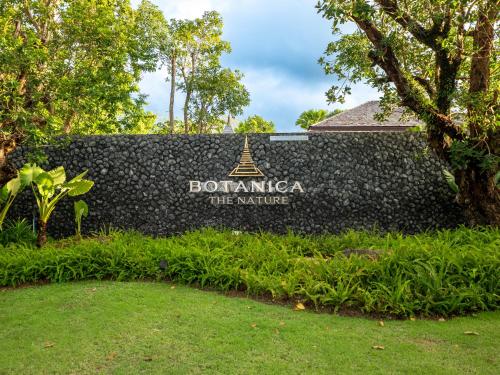 a sign for boontana the institute at Exclusive Villa Botanica in Bang Tao Beach