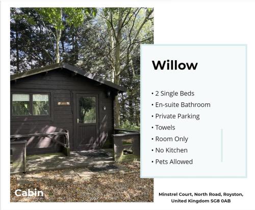 a small cabin in the woods with a door at Willow by Paymán Club in Royston