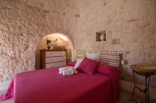 Krevet ili kreveti u jedinici u objektu Trulli&Dimore - Villa Luna