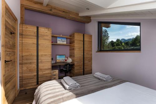 Postel nebo postele na pokoji v ubytování Chalet Aigle