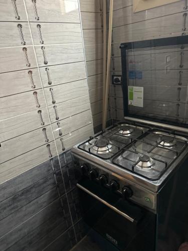 a stove top oven sitting inside of a kitchen at قويسنا محافظة المنوفيه 