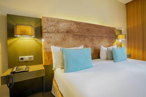 Katil atau katil-katil dalam bilik di Hotel Constanza