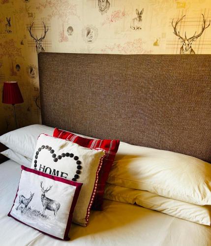 Ένα ή περισσότερα κρεβάτια σε δωμάτιο στο Dunroamin Bed and Breakfast