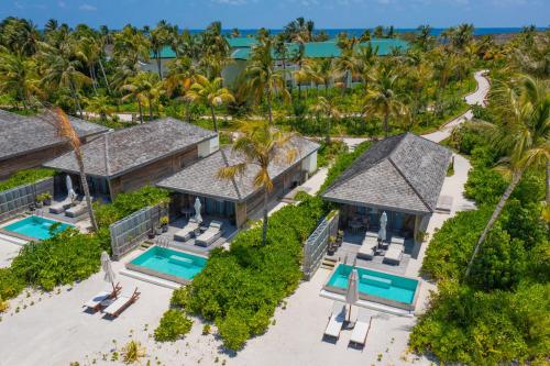 an aerial view of the villas at the resort at Kagi Maldives Resort & Spa in North Male Atoll