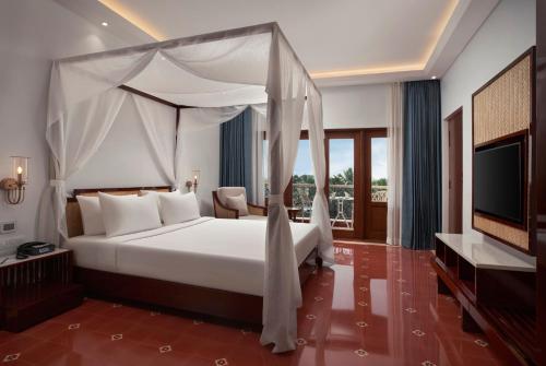 Postel nebo postele na pokoji v ubytování Radisson Blu Resort, Goa